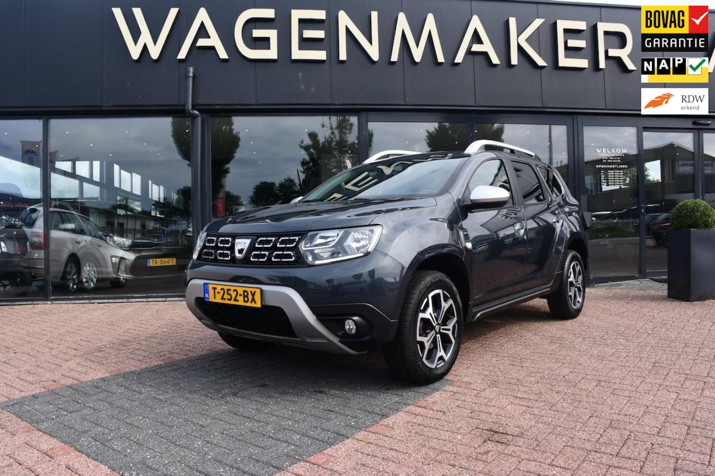 Dacia Duster - 1.6 SCe Comfort Clima|Cruise|NAVI|CAM|4X4|HAAK - AutoWereld.nl