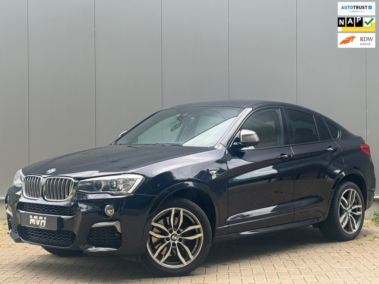 BMW X4 - M40i High Executive - Automaat - Panorama - Leder - H&K - HUD - Carplay - Keyless - AutoWereld.nl