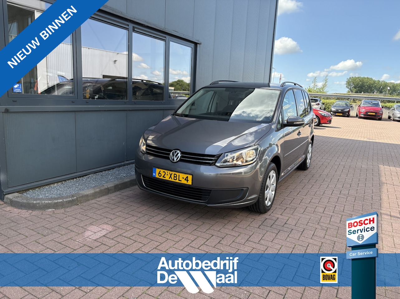 Volkswagen Touran - 1.2 TSi Comfortline 7-persoons CLIMA/CRUISE/NAVI/PDC/TREKHAAK - AutoWereld.nl