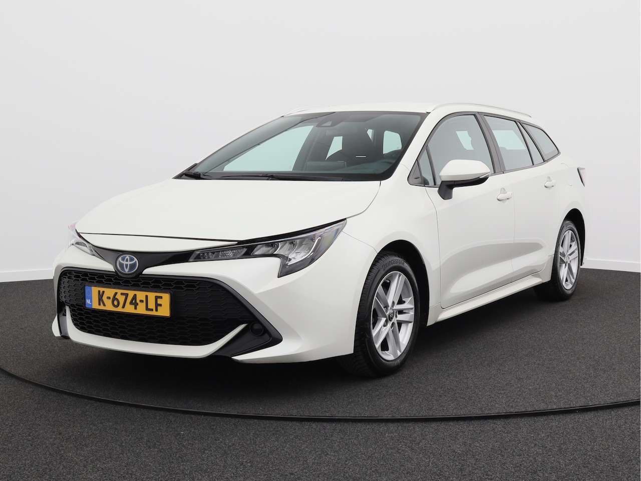 Toyota Corolla Touring Sports - 1.8 Hybrid Business/ lage km/ zeer mooi! - AutoWereld.nl