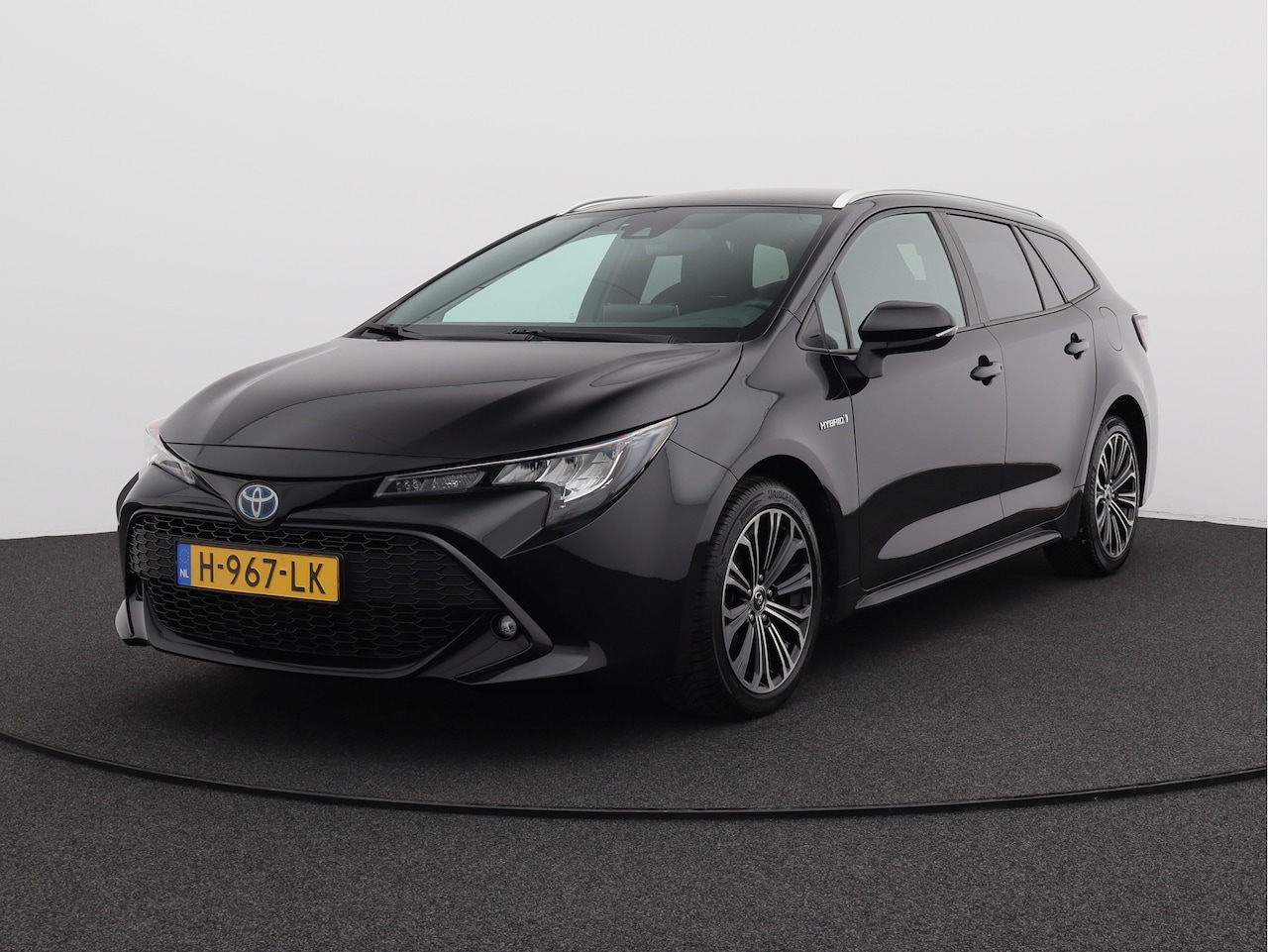 Toyota Corolla Touring Sports - 1.8 Hybrid Business Plus/ lage km/ trekhaak! - AutoWereld.nl