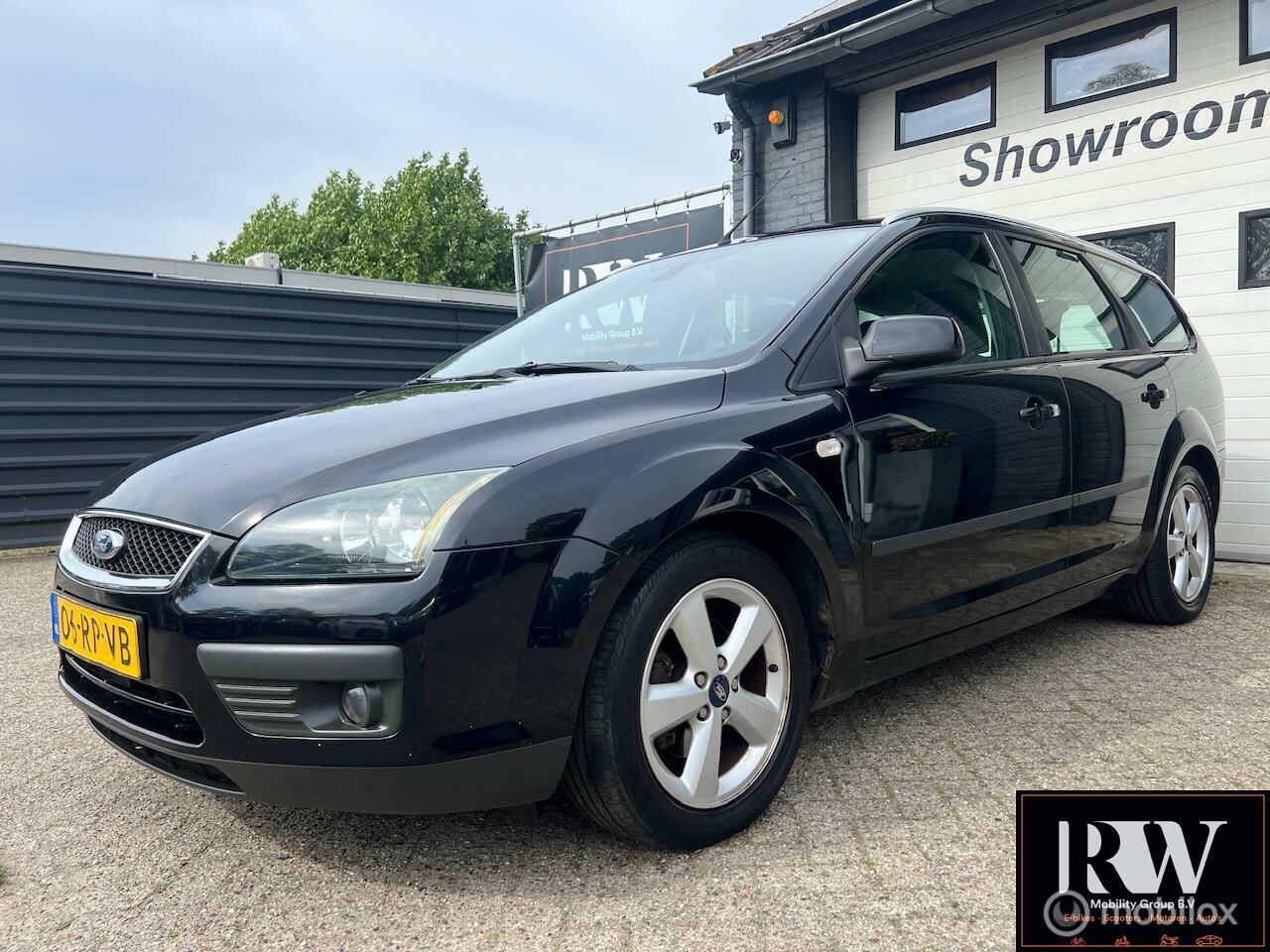Ford Focus Wagon - 1.6-16V Ambiente Airco, trekhaak - AutoWereld.nl