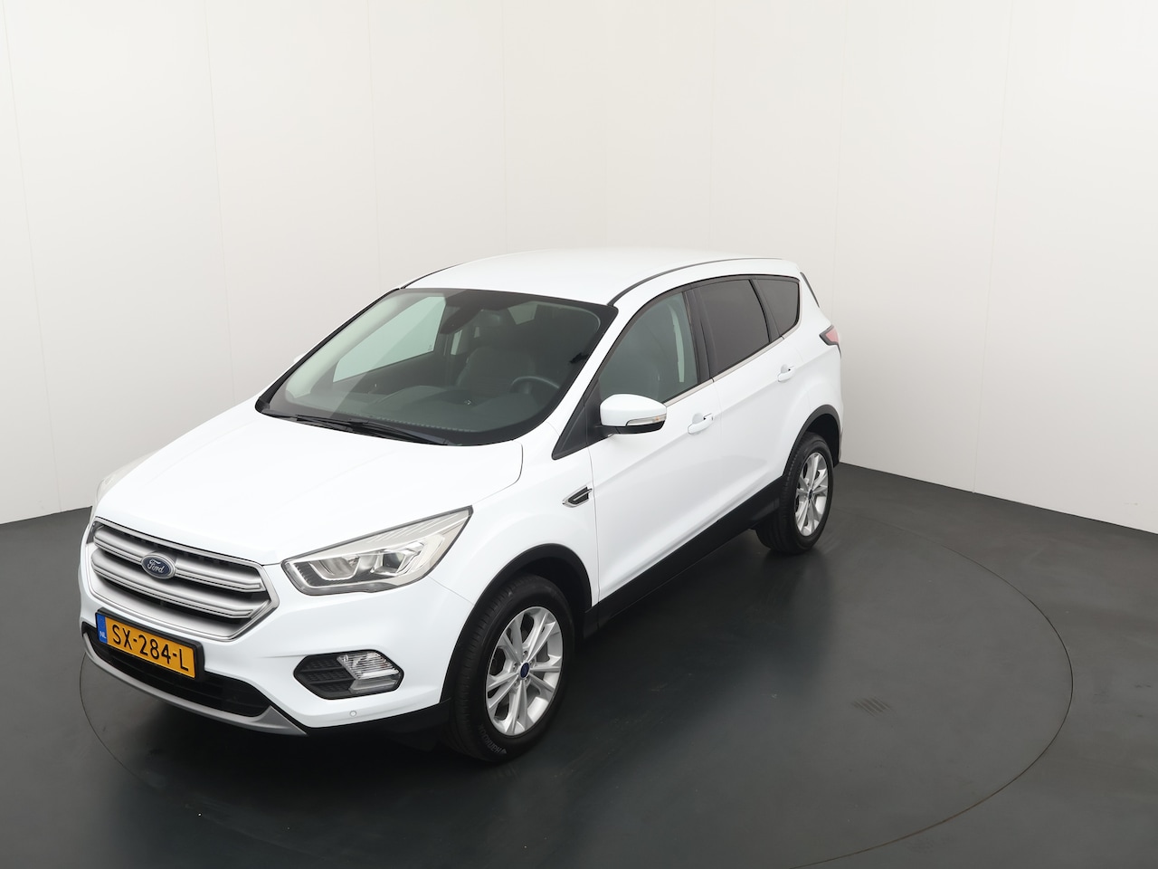 Ford Kuga - 1.5 EcoBoost Titanium | Elek. Achterklep | Trekhaak | Camera | Half leder | Auto-inparkere - AutoWereld.nl