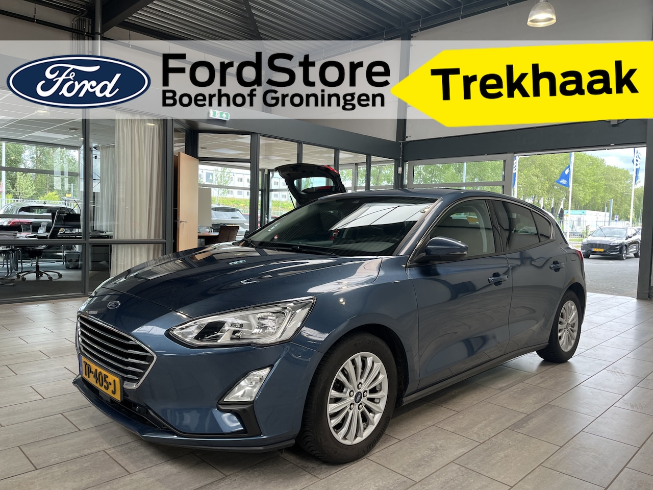 Ford Focus - EcoBoost 125PK Titanium Business | Trekhaak | Winter Pack | Keyless | Navi | Park. Sens. V - AutoWereld.nl