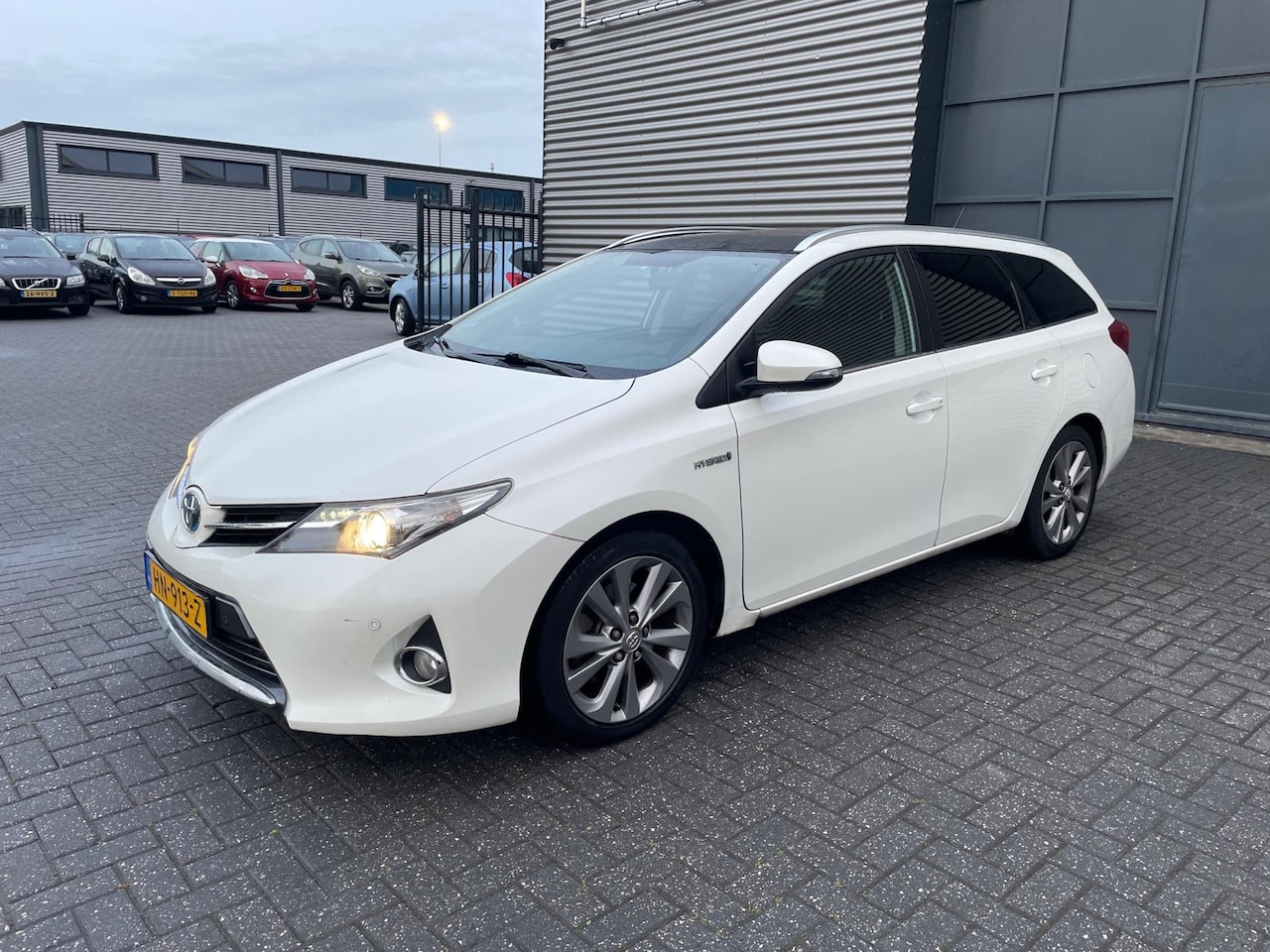 Toyota Auris Touring Sports - 1.8 Hybrid Lease Pro|panorama| - AutoWereld.nl