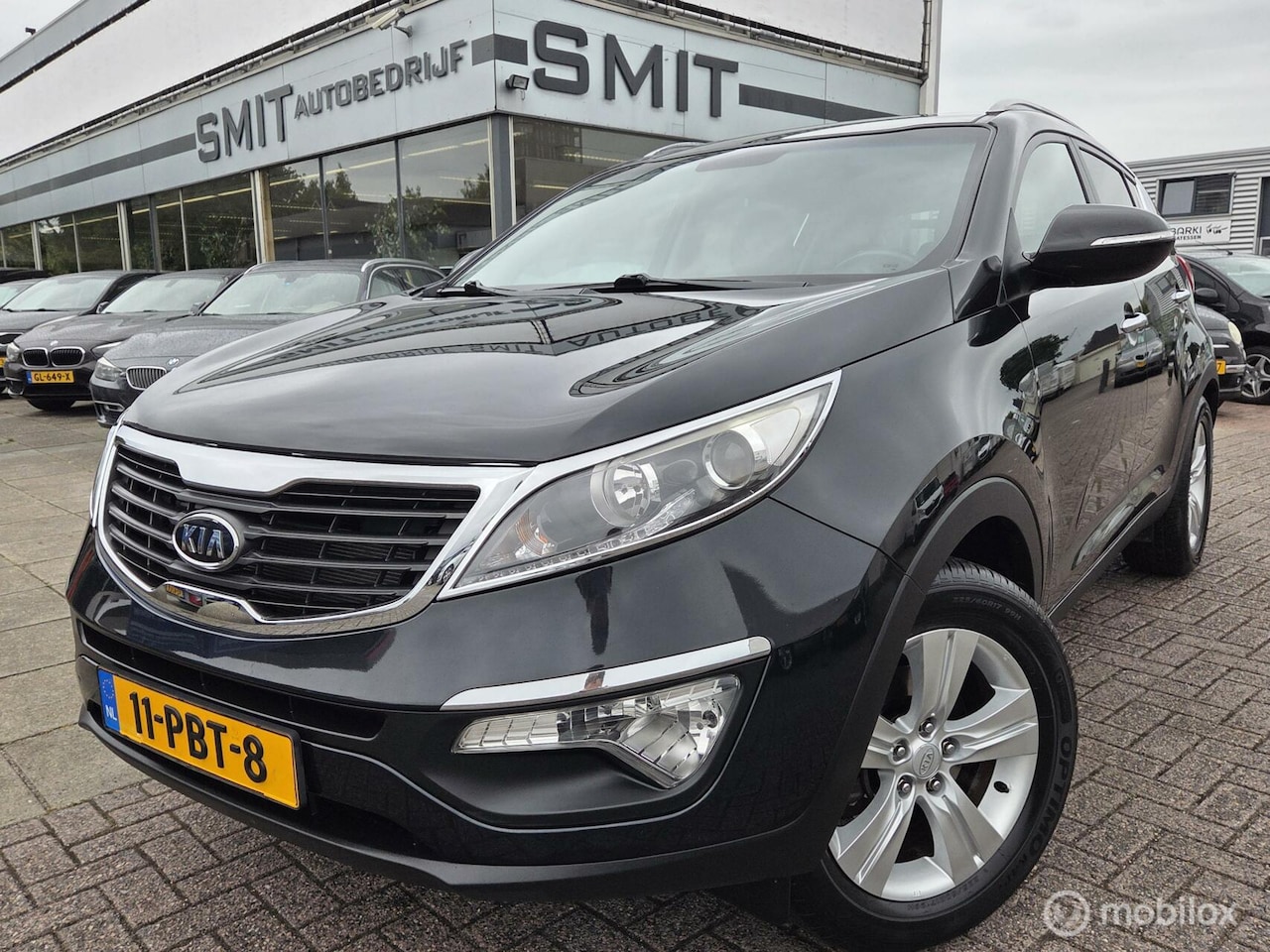 Kia Sportage - 1.6 GDI ISG X-ecutive Plus Pack Nav/Trekhaak - AutoWereld.nl