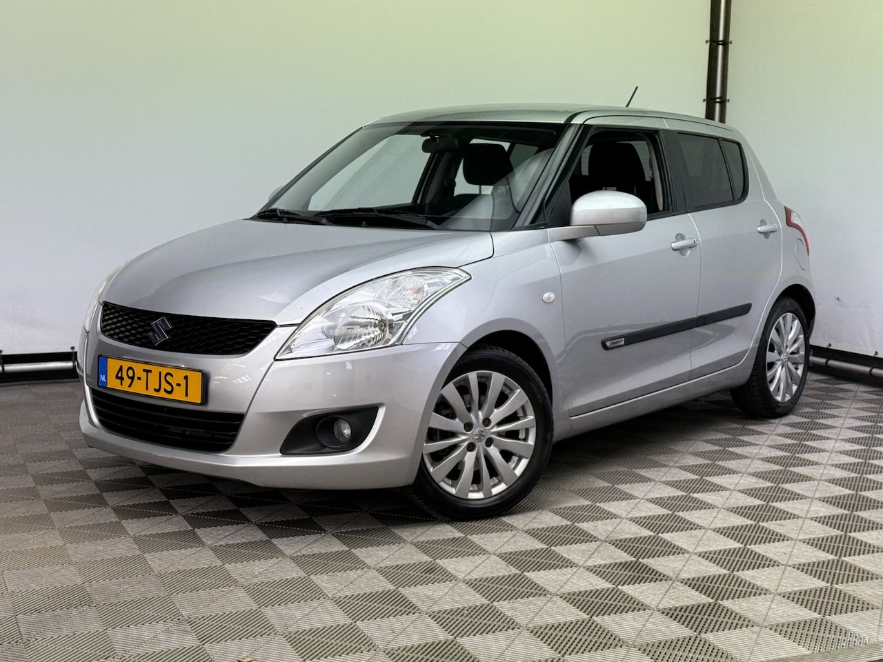 Suzuki Swift - 1.2 Exclusive Automaat Trekhaak 1e Eigenaar - AutoWereld.nl