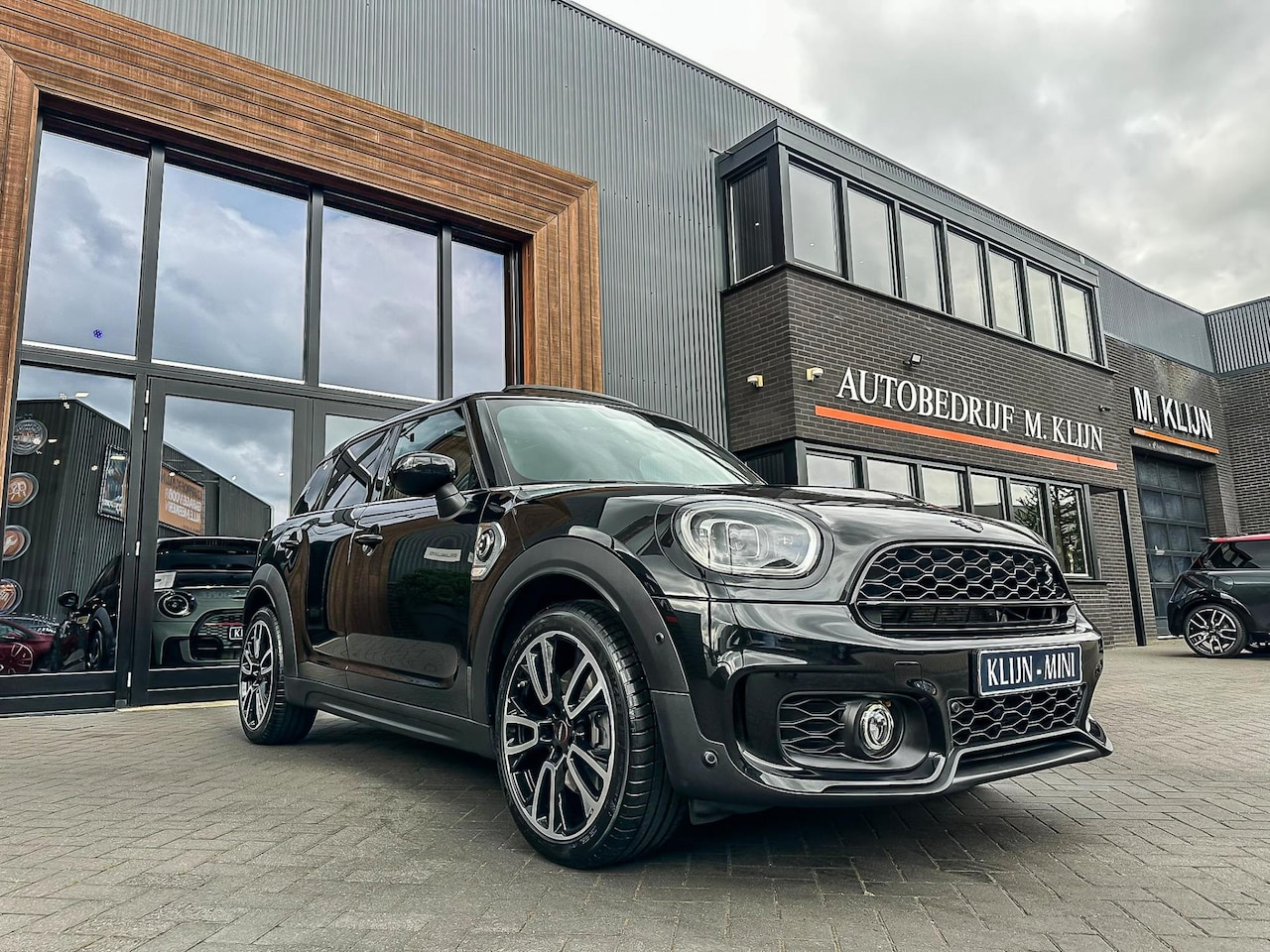 MINI Countryman - Mini 2.0 Cooper S E ALL4 John Cooper Works 220pk/Leer/Pano/Camera/HK/Vol - AutoWereld.nl