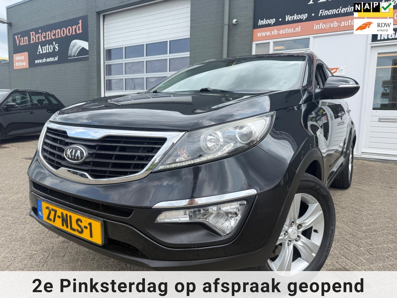 Kia Sportage - 2.0 X-ecutive Plus Pack met trekhaak en parkeersensoren en bluetooth telefoon en cruise co - AutoWereld.nl