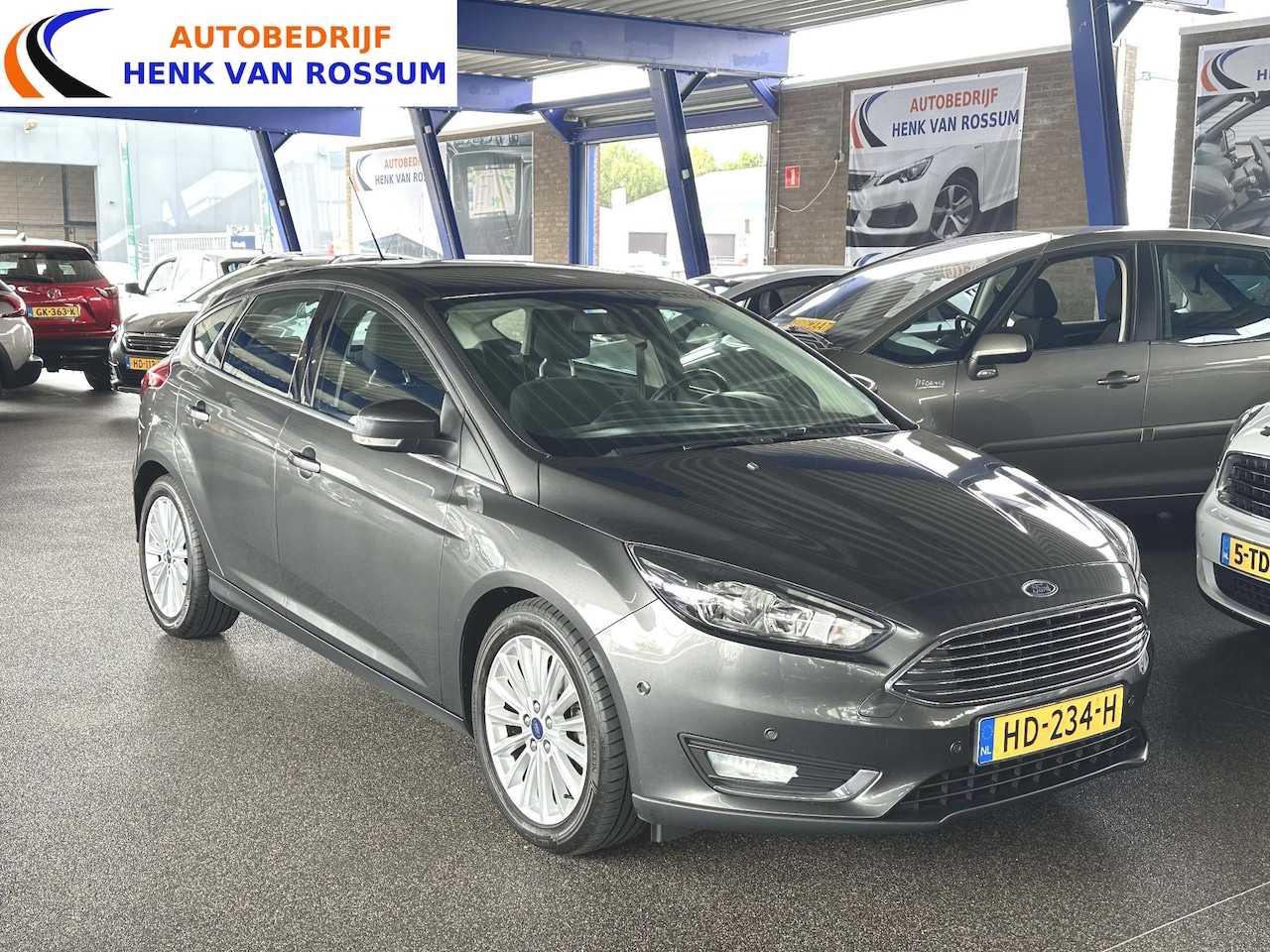 Ford Focus - 1.0 Titanium Edition Clima | PDC v+a | Cruise | Navi | NAP. - AutoWereld.nl