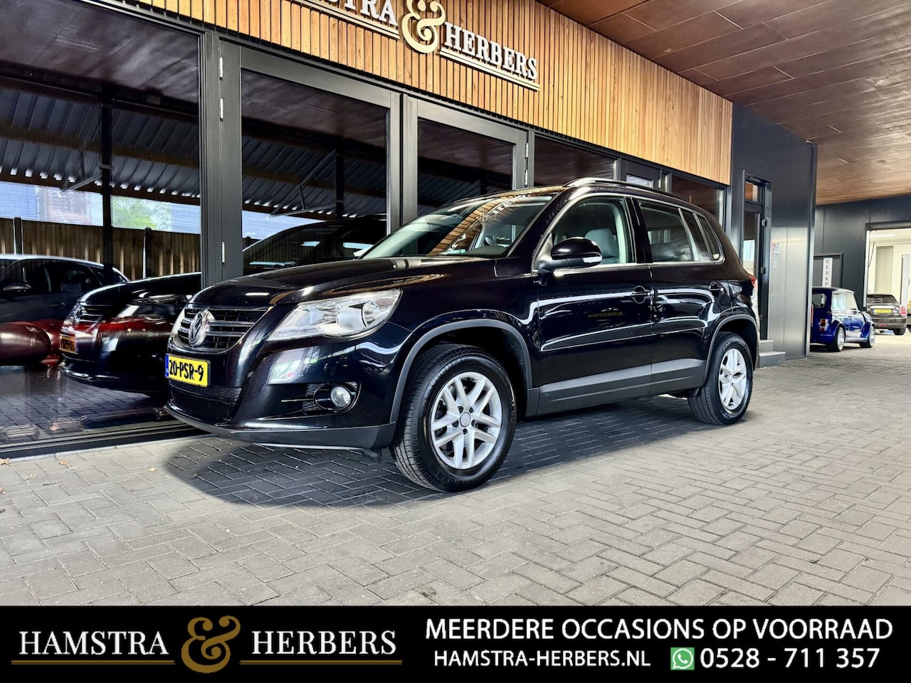 Volkswagen Tiguan - 1.4 TSI Sport&Style zwart - AutoWereld.nl