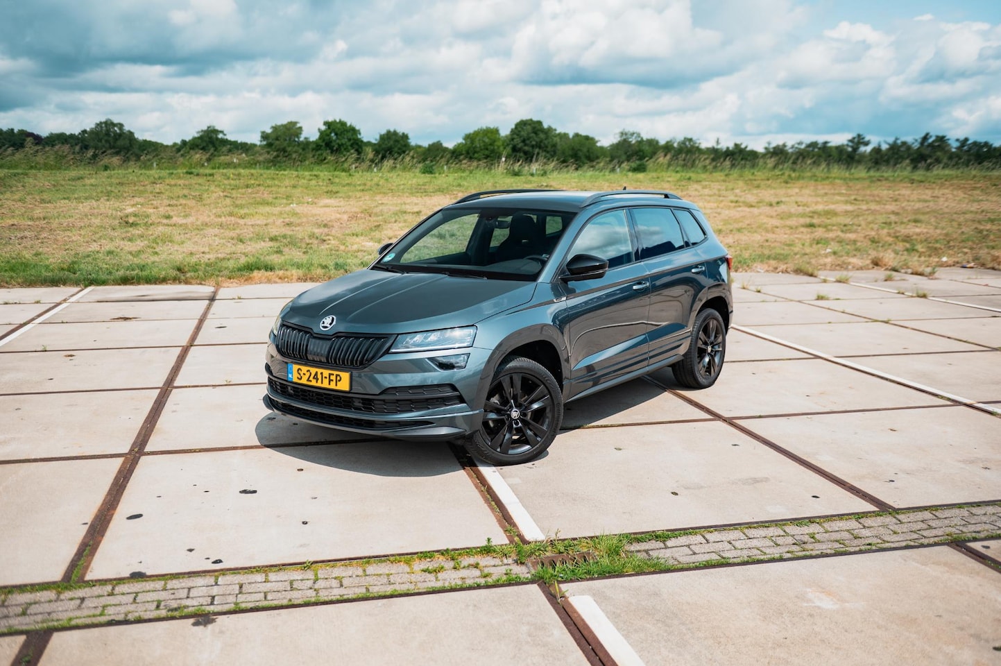 Skoda Karoq - 1.5 TSI ACT Sportline Business | TREKHAAK | DIGI DASH | CLIMA | NAVI - AutoWereld.nl