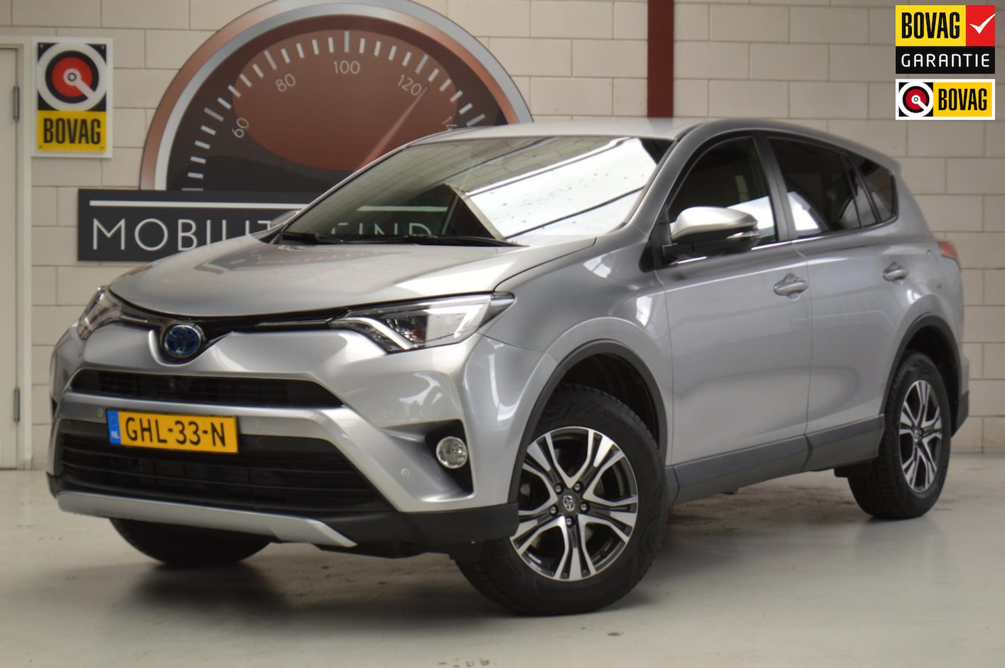 Toyota RAV4 - 2.5 Hybrid AWD Executive LEDER, TREKHAAK, nwe ALL-SEASON banden - AutoWereld.nl