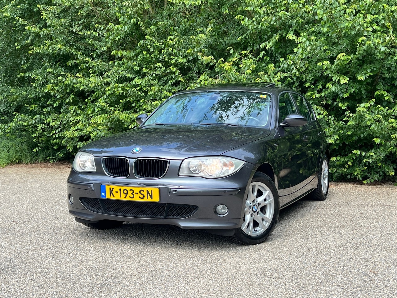 BMW 1-serie - 120i High Executive | Schuifdak + Cruise + Leder | - AutoWereld.nl