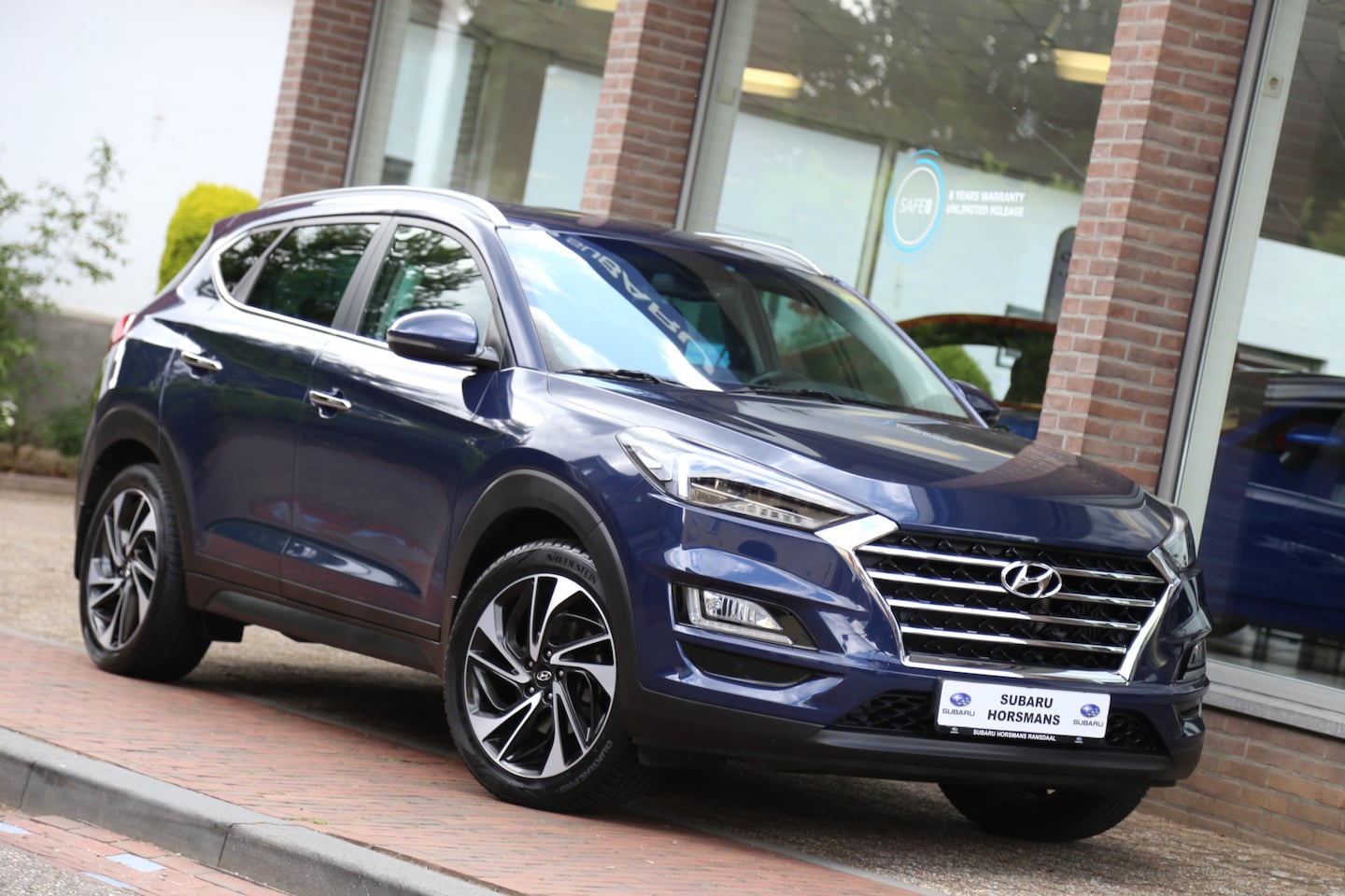 Hyundai Tucson - 1.6 T-GDI 4WD Premium Automaat Leer Camera Navi - AutoWereld.nl
