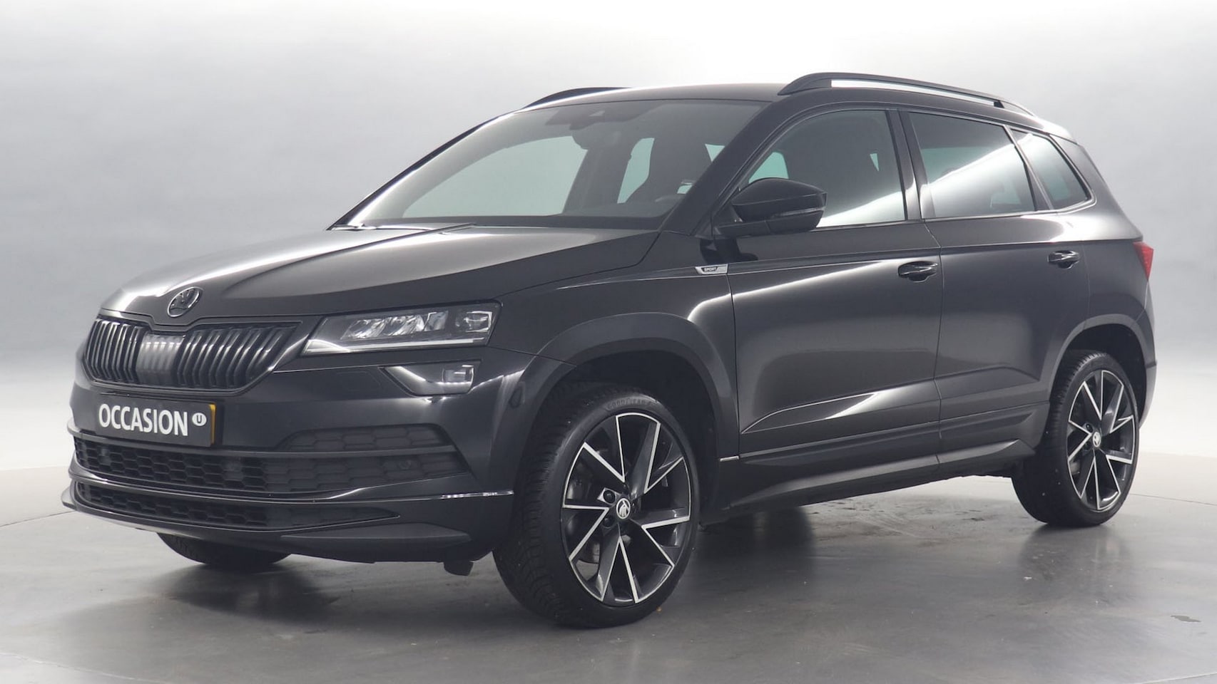 Skoda Karoq - 1.5 TSI 150pk ACT Sportline Business DSG / Navigatie / Stoelverwarming / Camera / Trekhaak - AutoWereld.nl