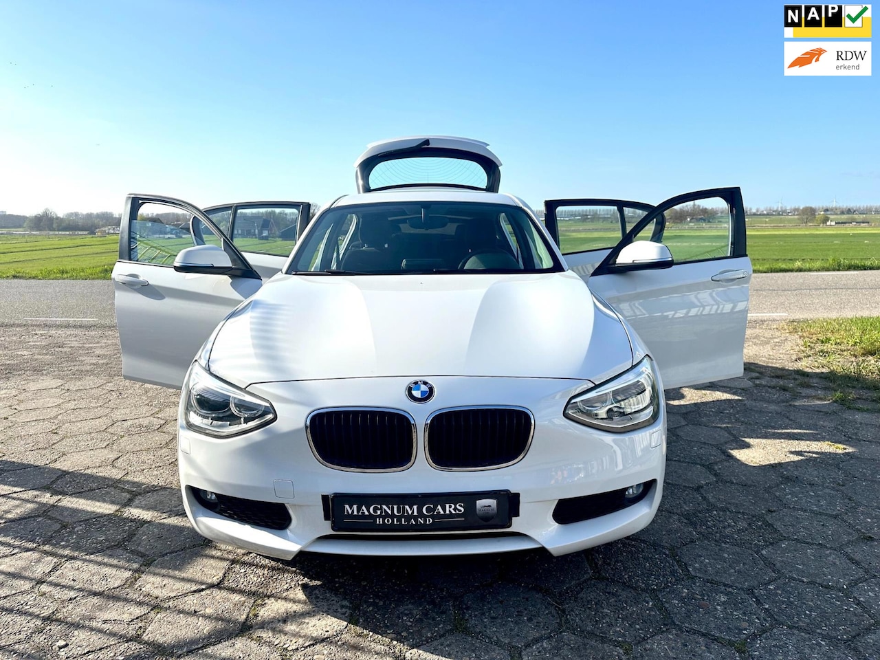 BMW 1-serie - 116i NAP 5Dr Airco Xenon Nw APK Navi Scherm Velgen Cruise Control - AutoWereld.nl