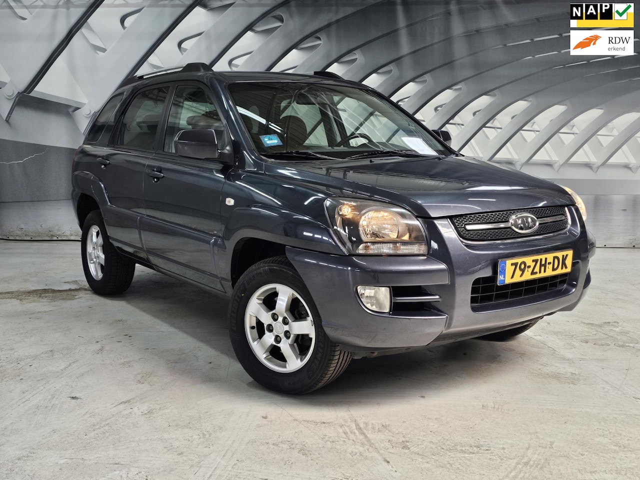 Kia Sportage - 2.0 CVVT X-ception leer clima - AutoWereld.nl