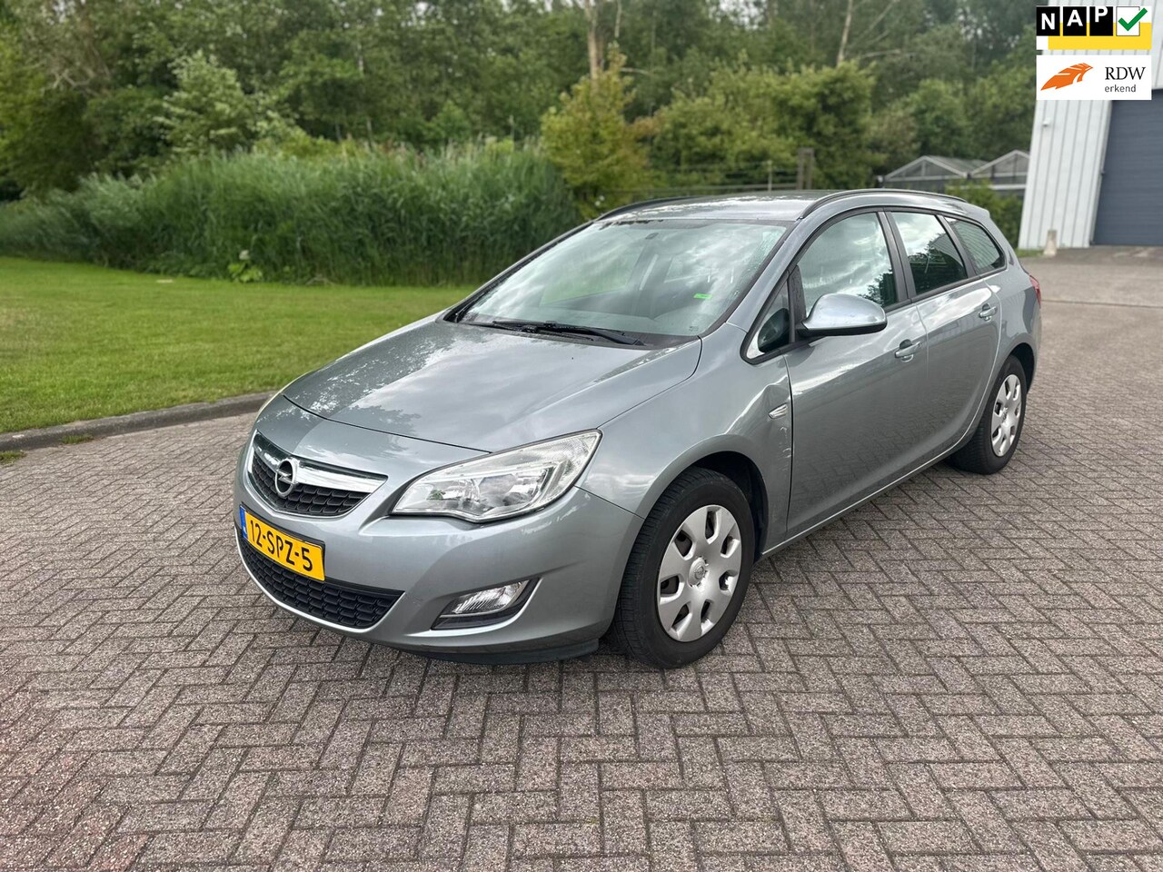 Opel Astra Sports Tourer - 1.4 Edition/AIRCO/CRUISE/NAVI/PARKEERSENS ACHTER - AutoWereld.nl
