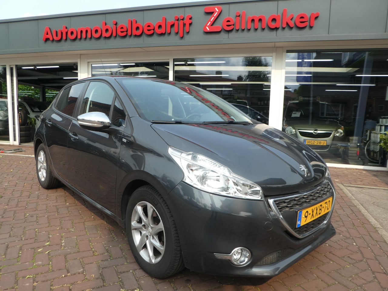Peugeot 208 - 1.2 VTi Style Airco, LM Velgen, Navi - AutoWereld.nl