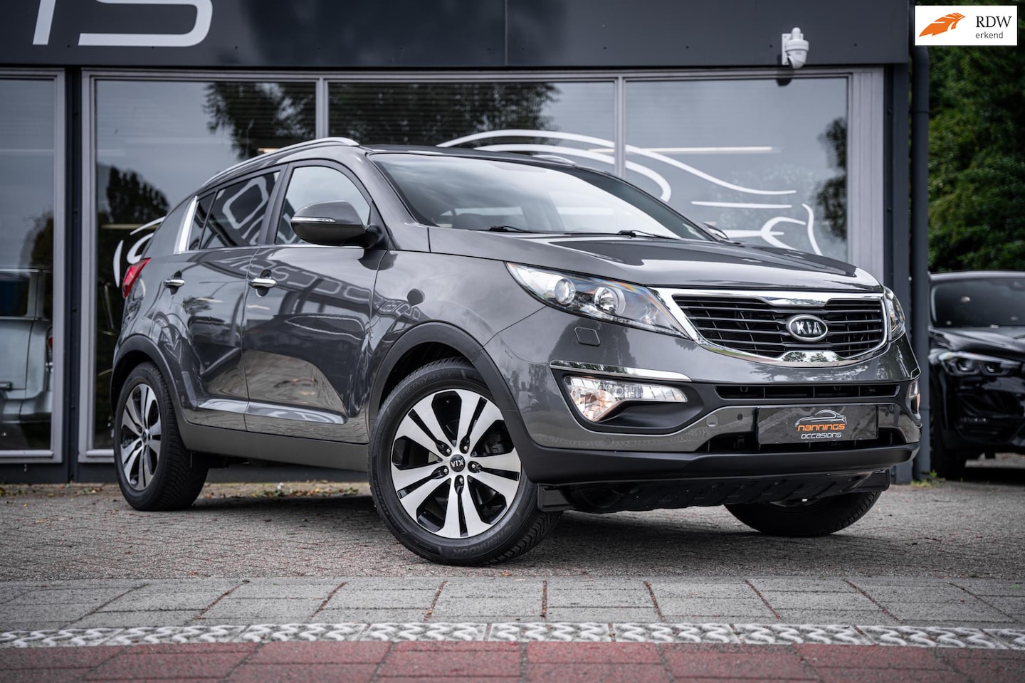 Kia Sportage - 2.0 X-ecutive Plus Pack|Automaat|Half leder|Camera|Cruise|PDC|Stoelverwarming - AutoWereld.nl