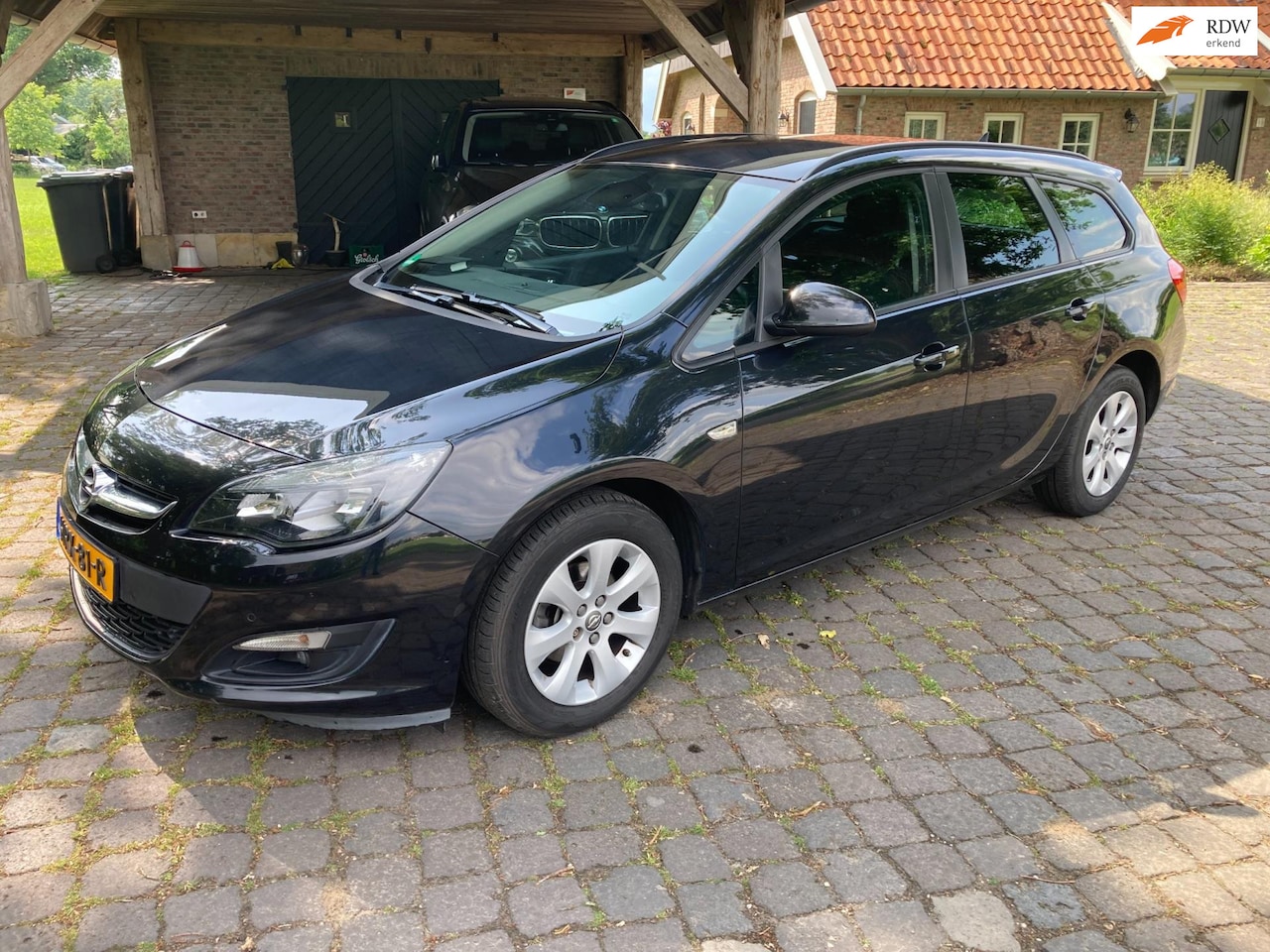 Opel Astra Sports Tourer - 1.4 Turbo Business + dealer onderhouden - AutoWereld.nl