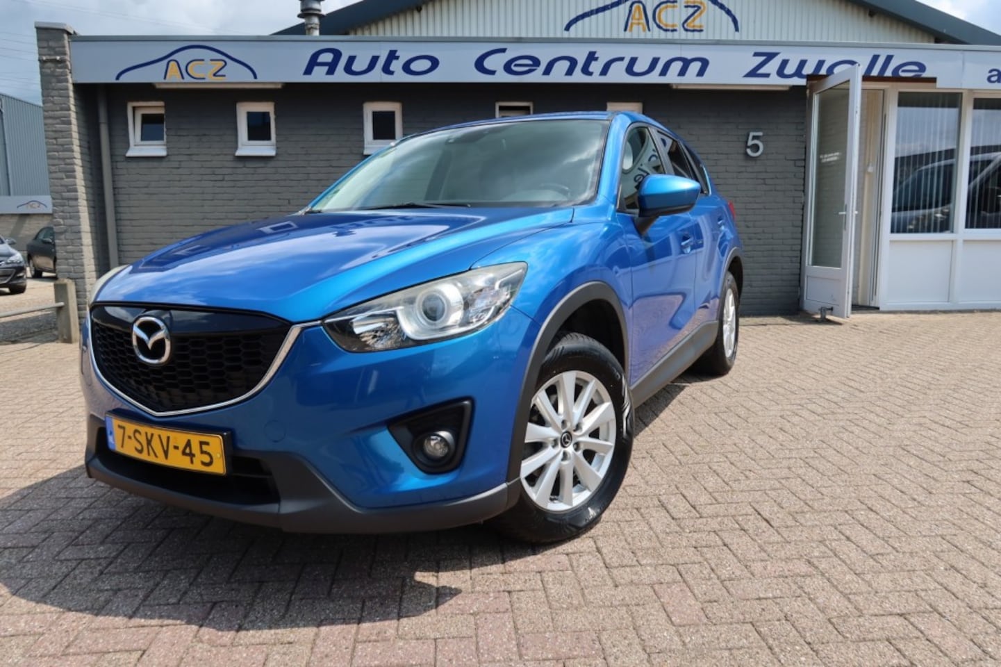 Mazda CX-5 - 2.0 SKYLEASE 2WD NAVI, TREKHAAK, CRUISE CONTROL ENZ... - AutoWereld.nl