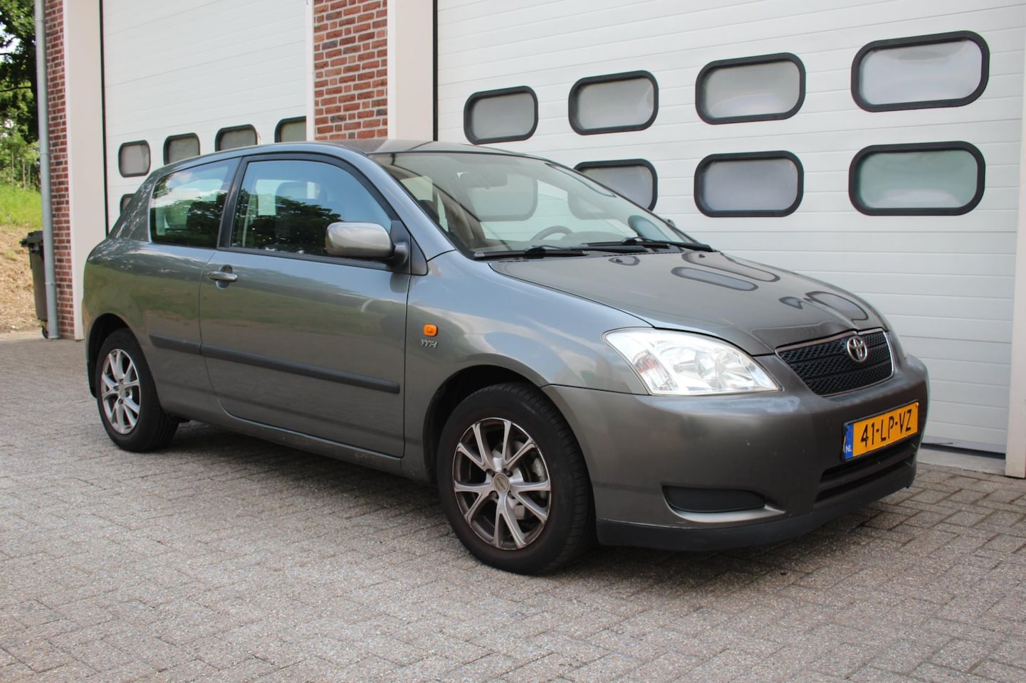Toyota Corolla - 1.4 VVT-i Linea Terra 3-Deurs * Airco / Nap * - AutoWereld.nl