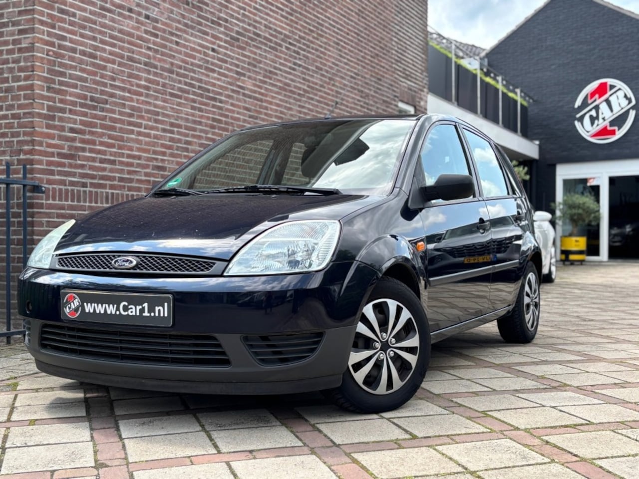 Ford Fiesta - 1.4 16V Trend 5 deurs AIRCO NIEUWE APK - AutoWereld.nl