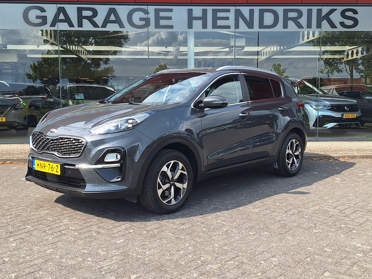 Kia Sportage - 1.6 GDI Dynamic Plus Line | Leder | Trekhaak | Bi Xenon | Climate | Navi | Camera | (occas - AutoWereld.nl