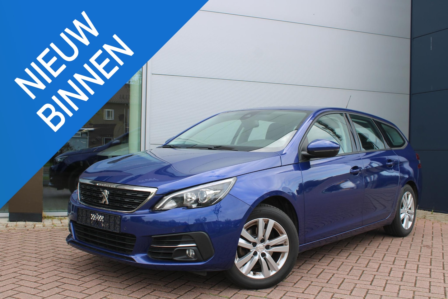 Peugeot 308 SW - 1.2 PureTech 110pk Blue Lease Active Airco Navi Carplay - AutoWereld.nl