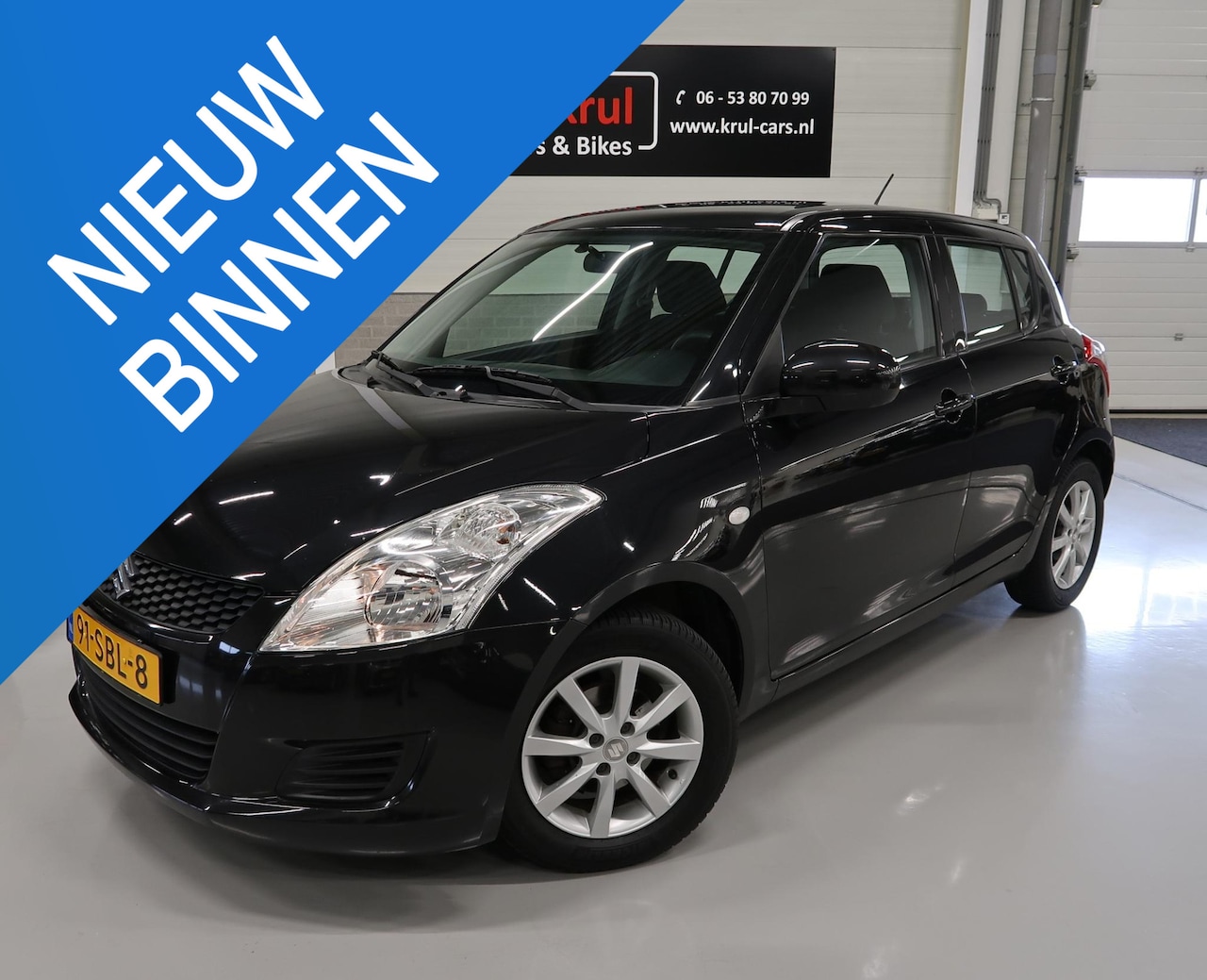 Suzuki Swift - 1.2 Comfort EASSS Airco 5-Deurs NL-auto NAP Boekjes Sportvelgen Stoelverwarming Zwart meta - AutoWereld.nl