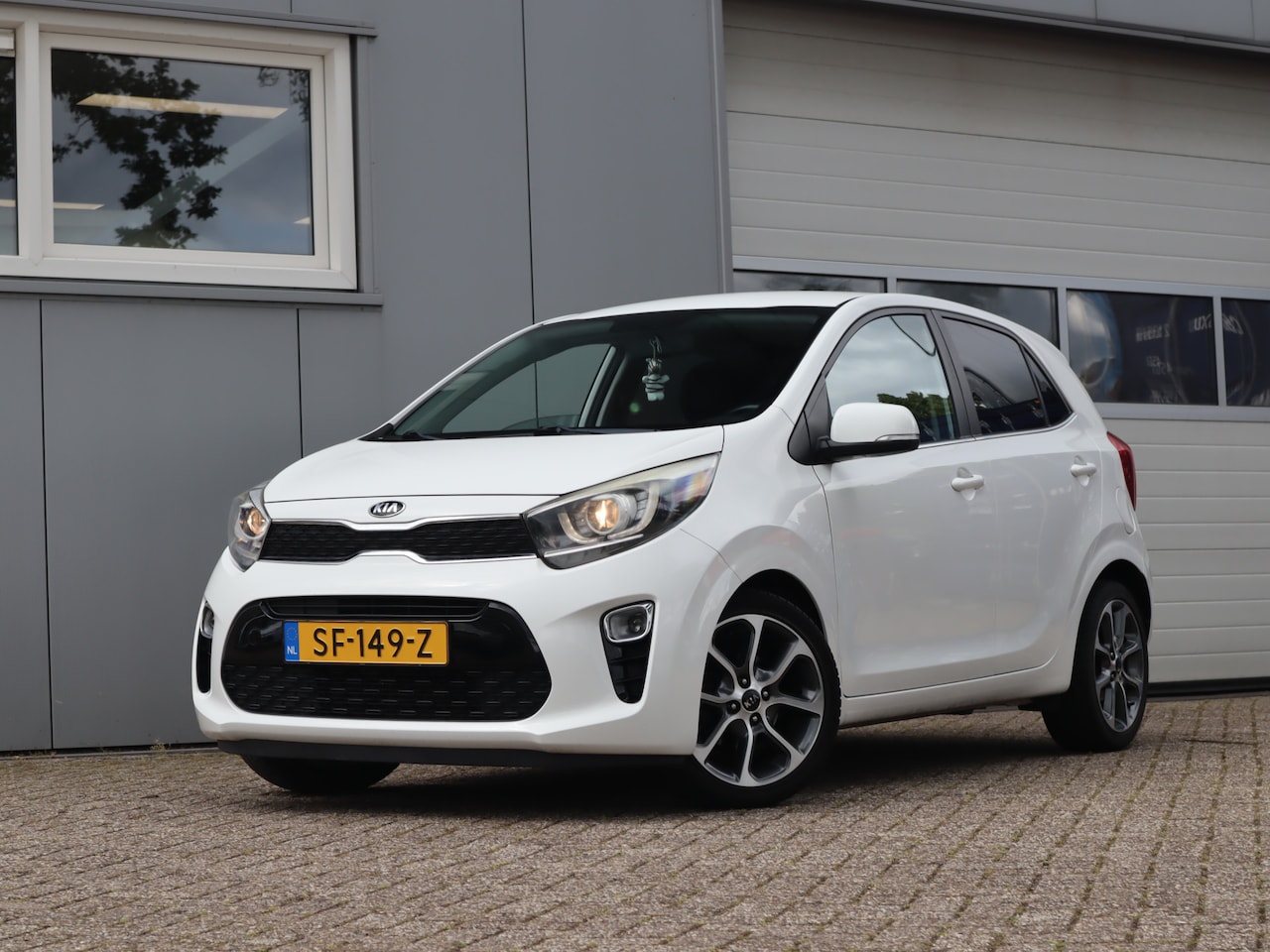 Kia Picanto - 1.0 CVVT Design Edition / Cruise / Camera / Leder / Navi - AutoWereld.nl