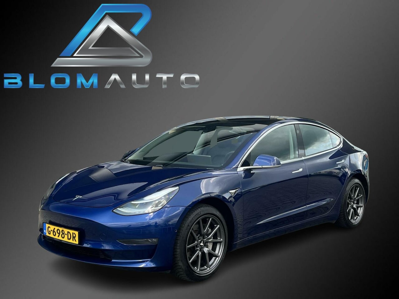 Tesla Model 3 - Long Range RWD Long Range AWD 75 kWh 352PK AUTOPILOT+TREKHAAK - AutoWereld.nl