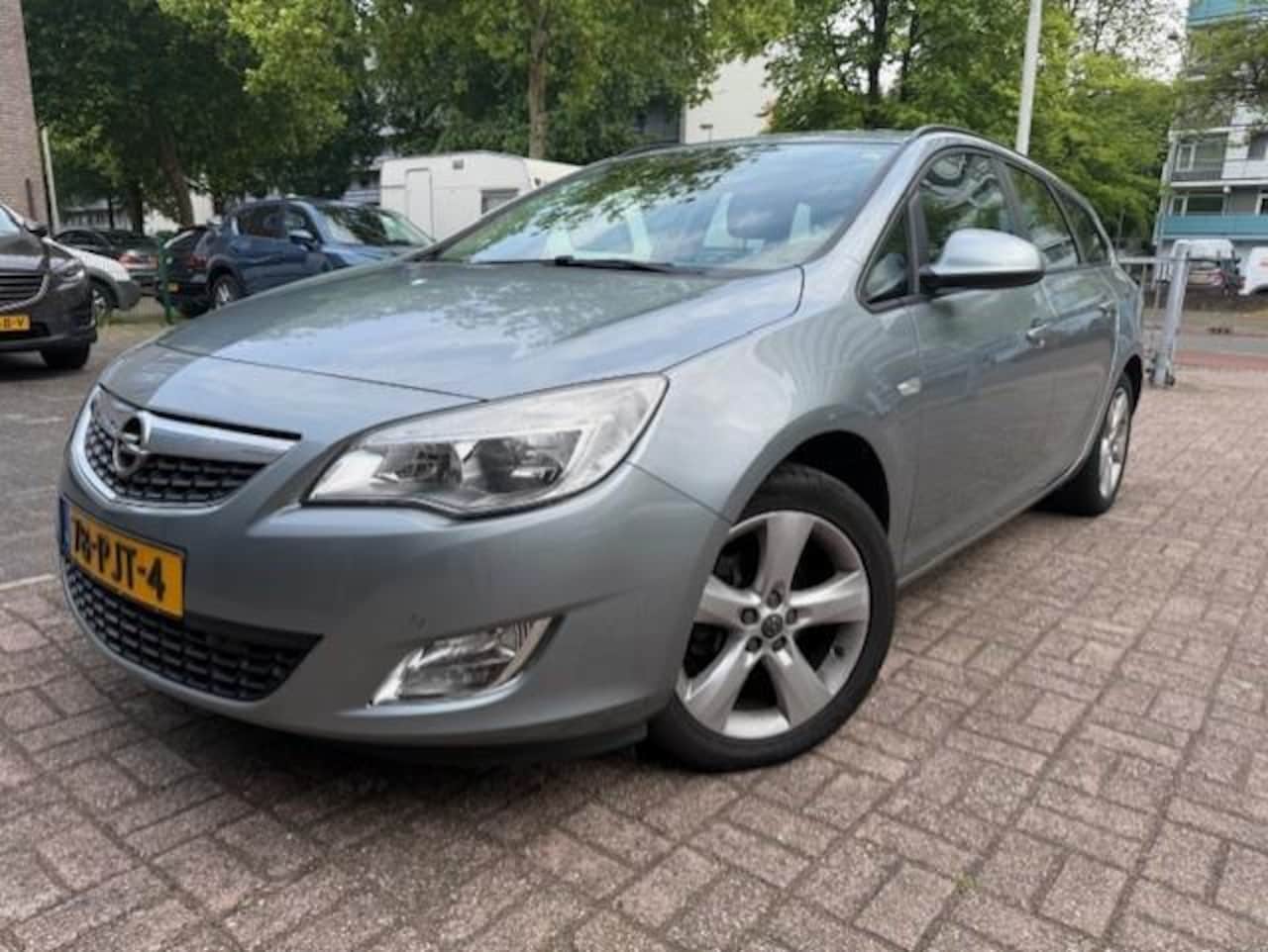 Opel Astra Sports Tourer - 1.4 Turbo Edition Navi/Clima/Cruise/Trekh - AutoWereld.nl