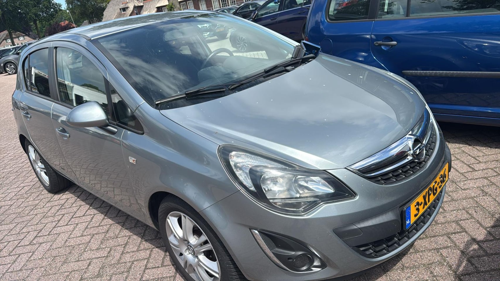 Opel Corsa - 1.4-16V BlitZ | 5deurs | Airco | Elek. Pakket | LM velgen | Grijs | Inruil mogelijk - AutoWereld.nl