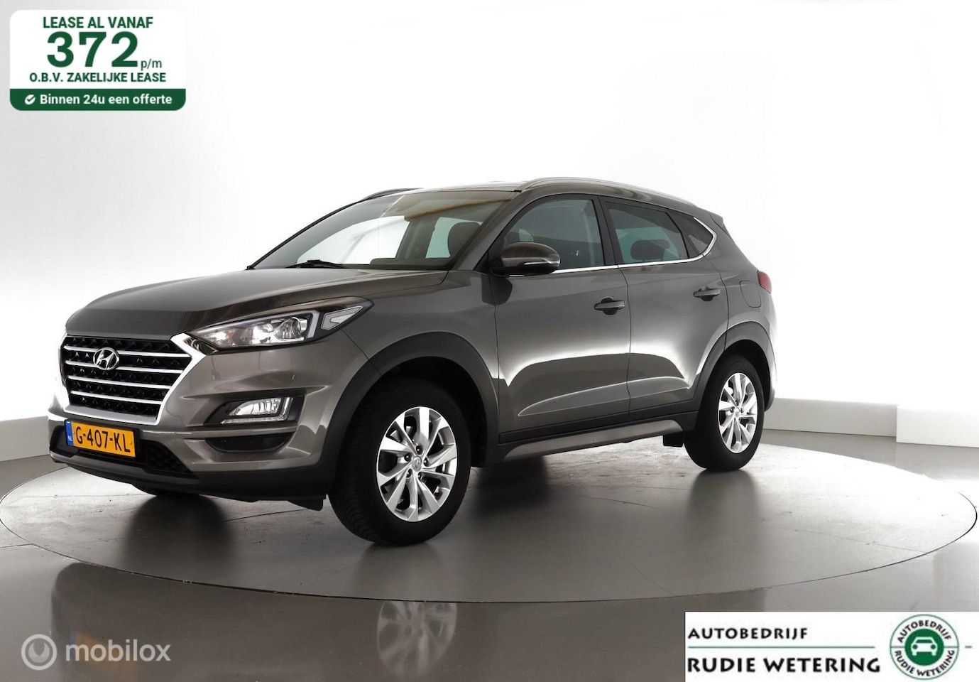 Hyundai Tucson - 1.6 GDI 131pk Comfort trekhaak|cam|nav|dab|ecc|lmv17 - AutoWereld.nl
