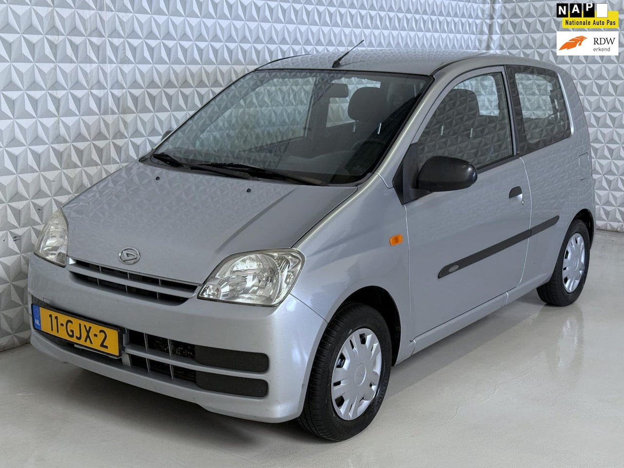Daihatsu Cuore - 1.0-12V 100th Anniversary + nieuwe APK! 139.000km (2008) - AutoWereld.nl