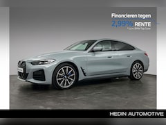 BMW i4 - eDrive40 High Executive 84 kWh | M Sportpakket | Elektrisch bediend glazen schuif-/kanteld