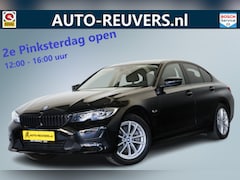 BMW 3-serie - 320e / LED / Navi / CarPlay / Cam / Clima