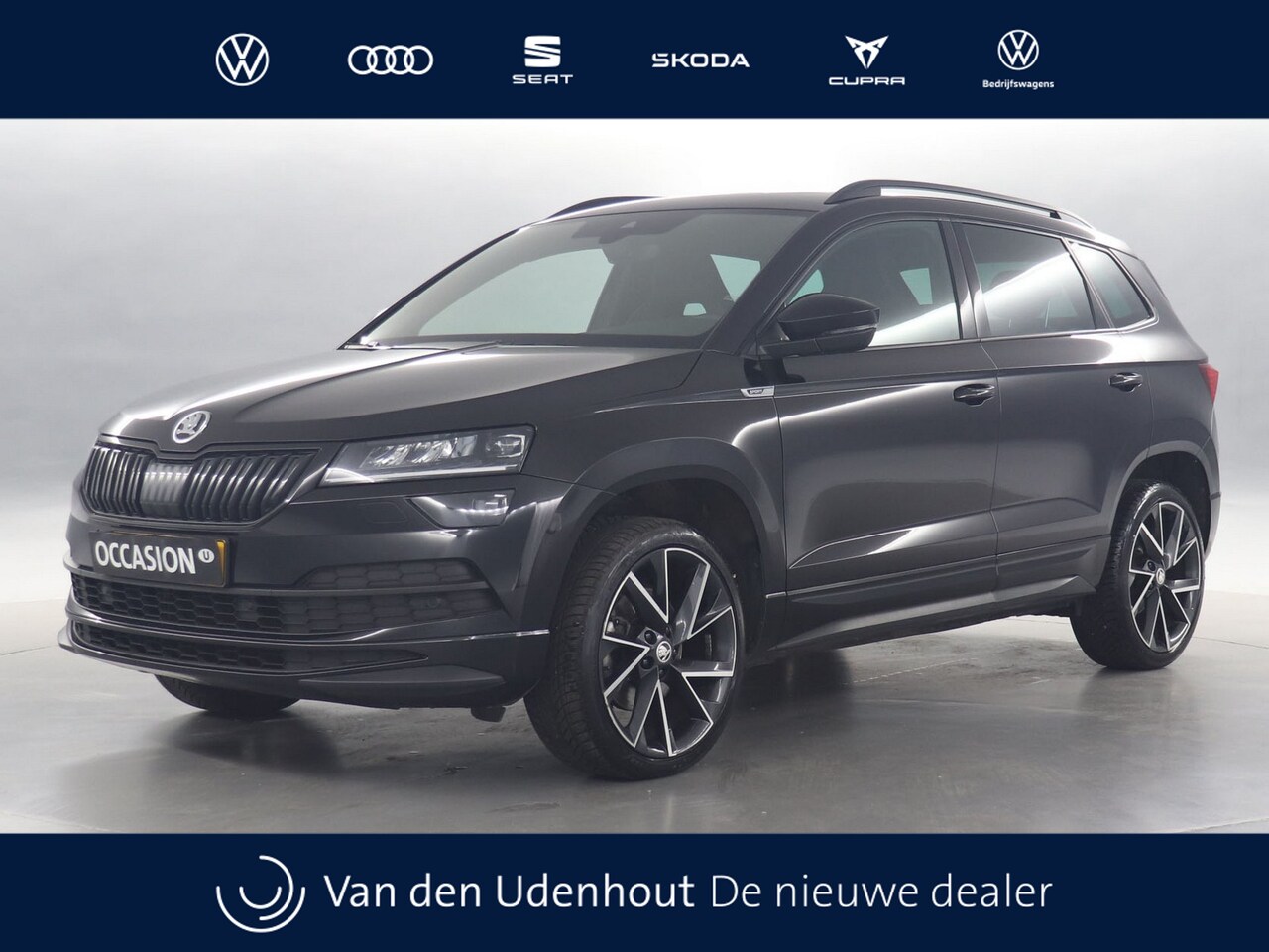 Skoda Karoq - 1.5 TSI 150pk ACT Sportline Business DSG / Navigatie / Panoramadak / Camera / Trekhaak - AutoWereld.nl