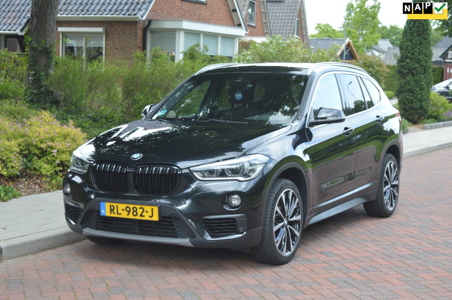 BMW X1 - SDrive18i Exe/Org NL/NAP/navi/elek-klep/camera - AutoWereld.nl
