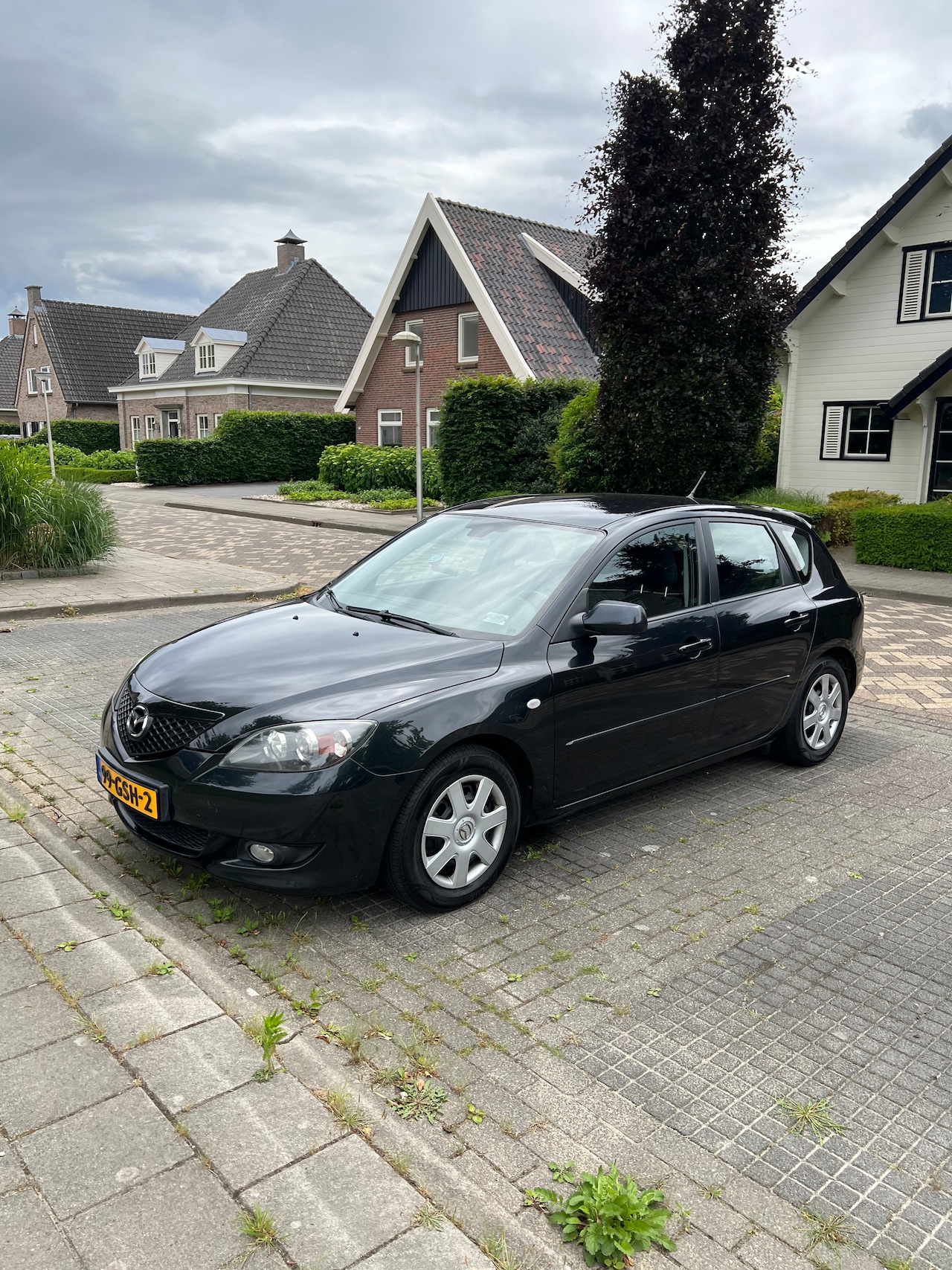 Mazda 3 - 1.6 S-VT Touring - AutoWereld.nl
