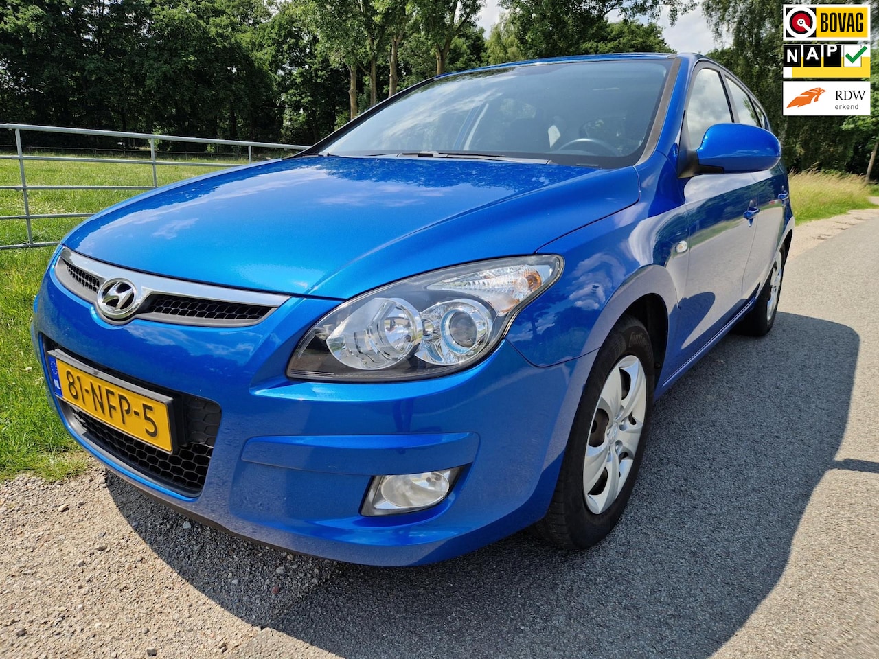 Hyundai i30 - 1.4i Blue Dynamic pas 79.286km dealer ond. met schuidak en airco - AutoWereld.nl