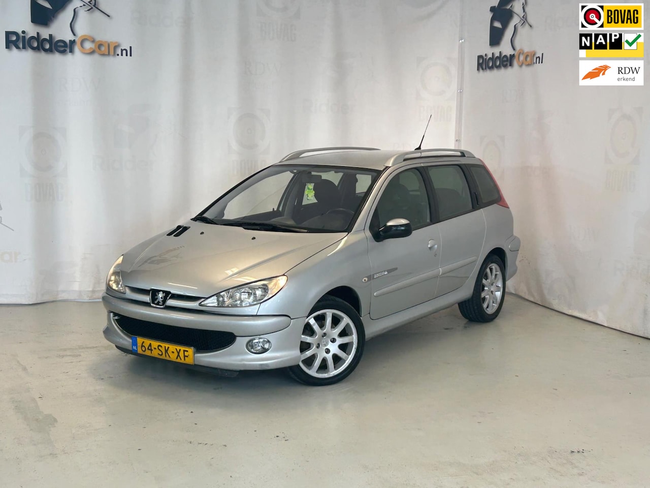 Peugeot 206 SW - 1.6 Quiksilver|NAP|VELGEN|AIRCO|BOEKJES|ELEK RAMEN|CENTR DEUR - AutoWereld.nl