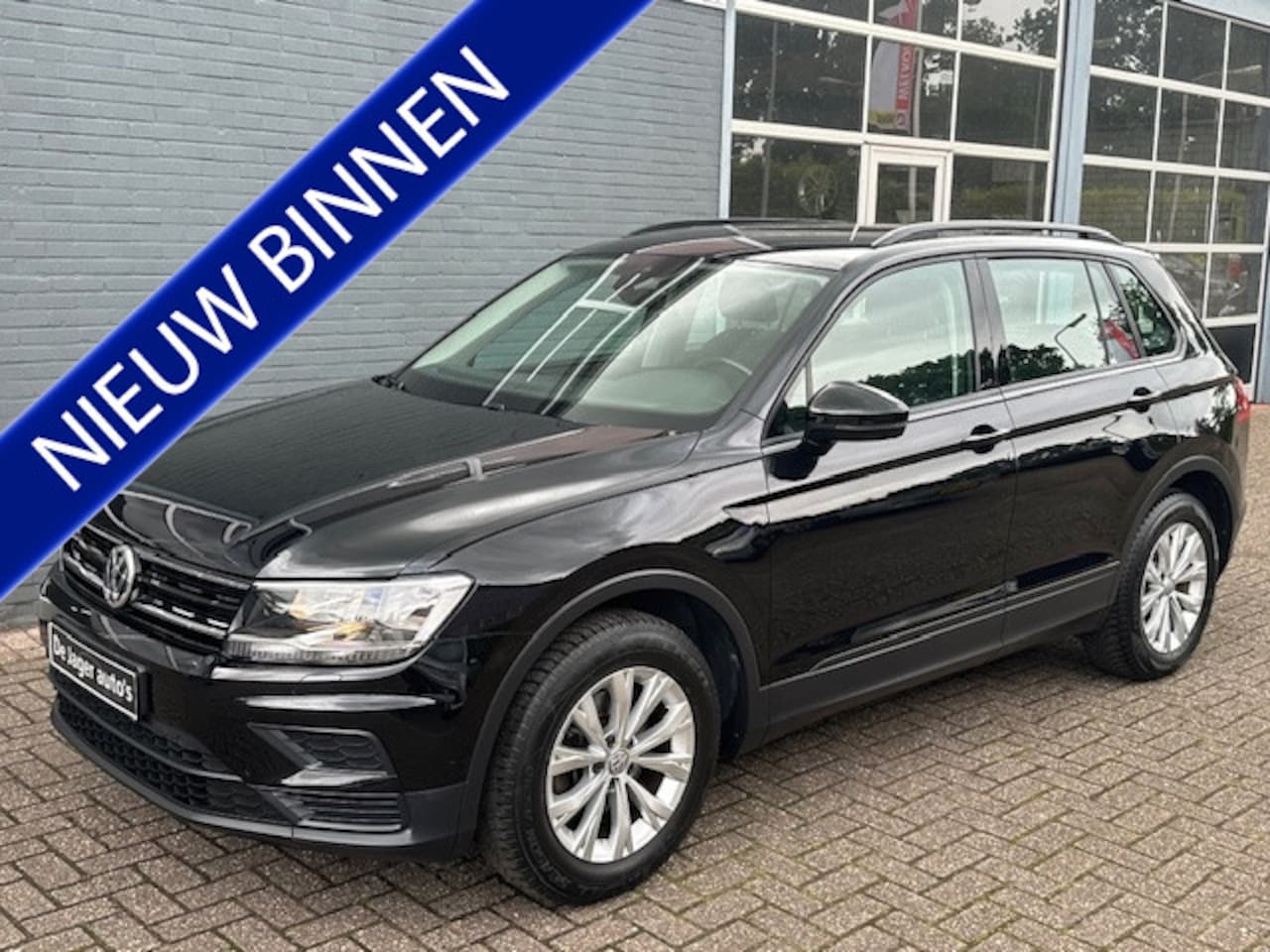 Volkswagen Tiguan - 1.4 TSI Trendline / Elektrisch wegklapbare trekhaak - AutoWereld.nl