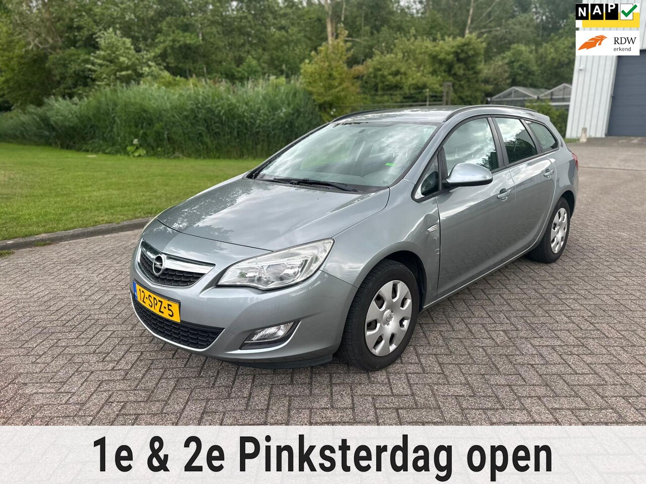 Opel Astra Sports Tourer - 1.4 Edition/AIRCO/CRUISE/NAVI/PARKEERSENS ACHTER - AutoWereld.nl