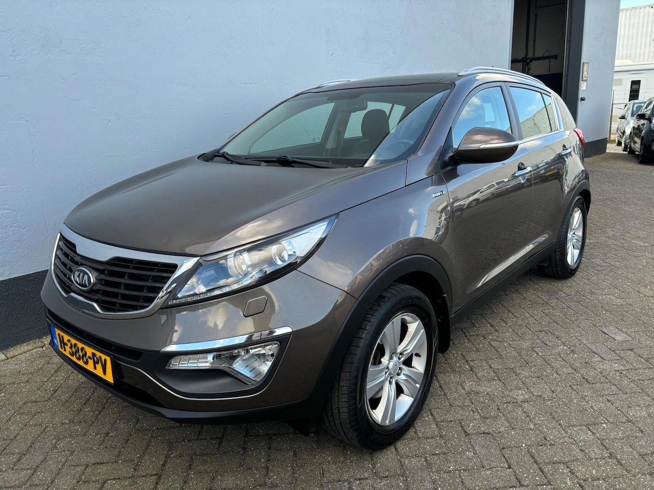 Kia Sportage - 2.0 X-ecutive 4wd Plus Pack - Panorama Dak - AutoWereld.nl