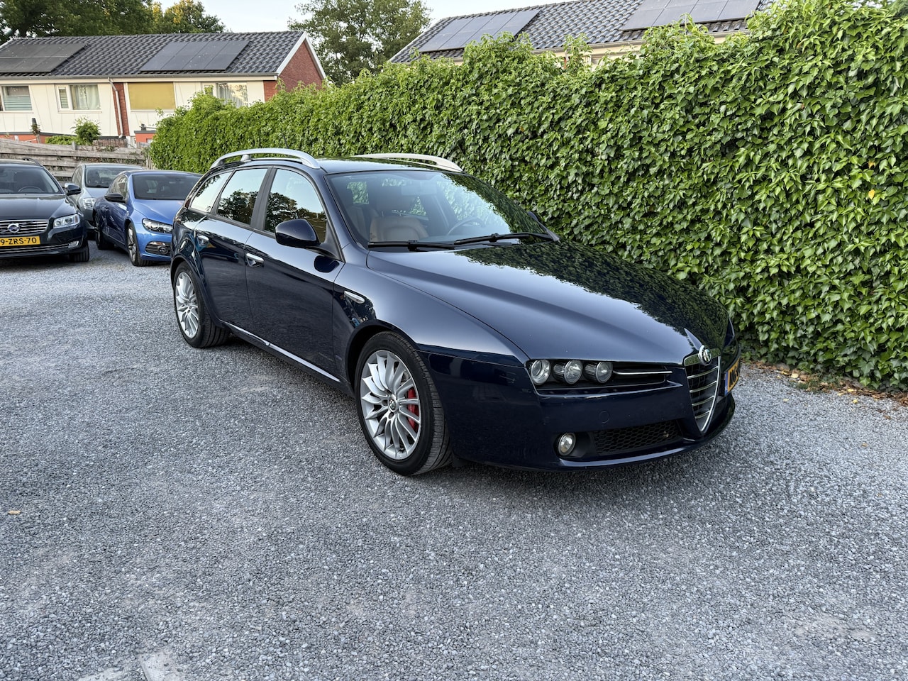 Alfa Romeo 159 Sportwagon - 2.0 JTD TI | Navi | Xenon | Leer | BOSE | Autom. Airco | Cruise Control | LMV | PDC | APK - AutoWereld.nl