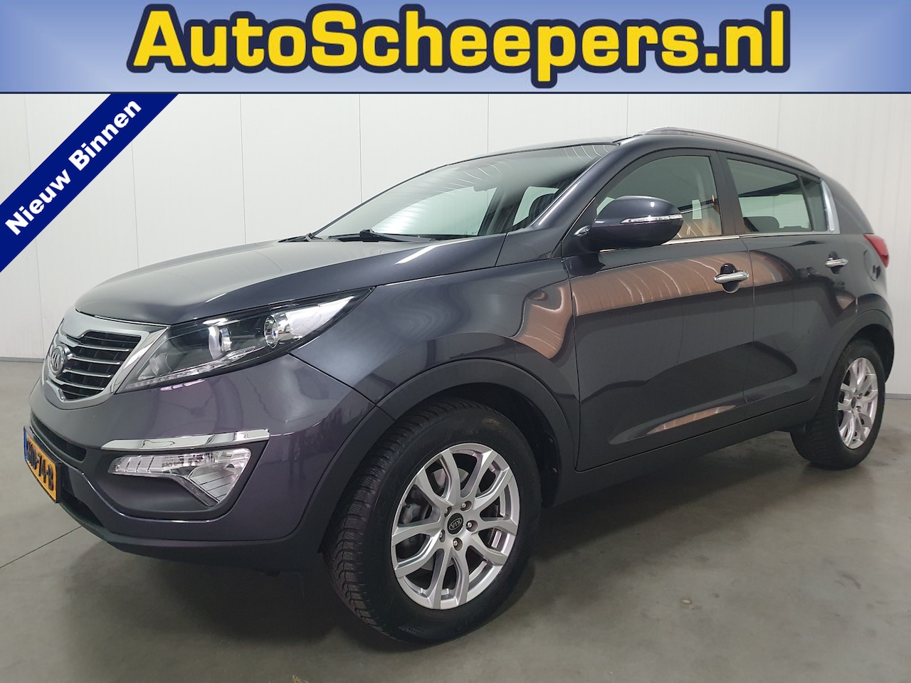 Kia Sportage - 1.6 GDI 20th Anniversary AIRCO/CRUISE/TRHAAK/LMV - AutoWereld.nl